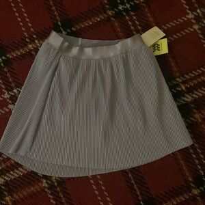NWT girls size large purple skort